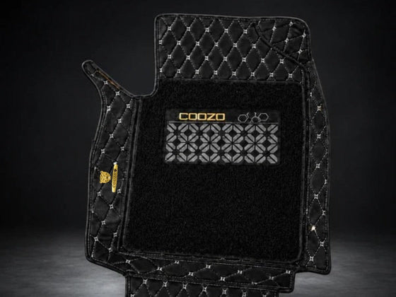 Black leatherette 7D car floor mat with diamond quilting and a removable washable coil insert