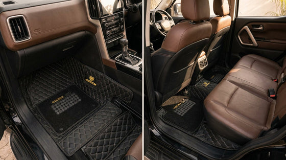 A full set of premium black 7D floor mats fitted across a modern Indian car cabin