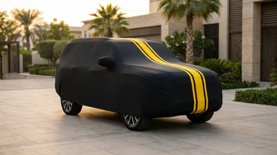 Toyota Fortuner fitted with a matte black DriveCult Spyro car body cover with twin yellow stripes