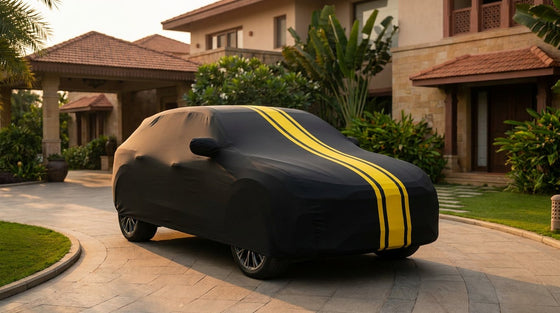 Tata Harrier fitted with a matte black DriveCult Spyro car body cover with twin yellow stripes