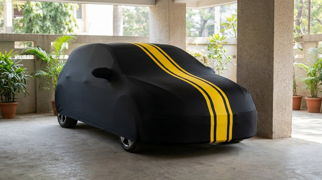 Hyundai i20 fitted with a matte black DriveCult Spyro car body cover with twin yellow stripes