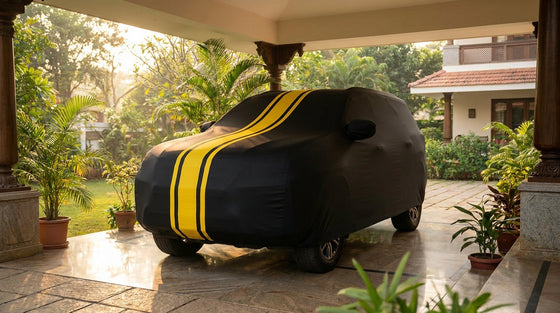 Mahindra Scorpio N fitted with a matte black DriveCult Spyro car body cover with twin yellow stripes