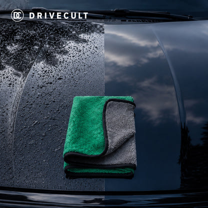 Microfibre cloth on a wet car bonnet