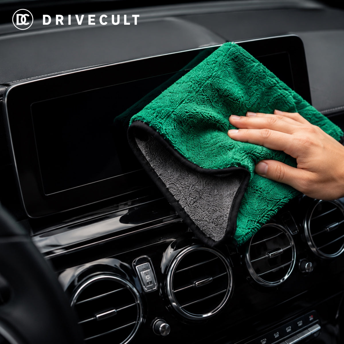 Cleaning a car touchscreen with the microfibre cloth