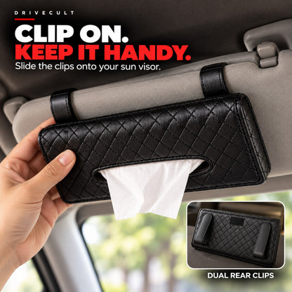 Sliding the dual rear clips of the tissue holder onto a car sun visor